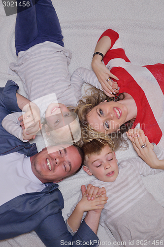 Image of happy young family at home