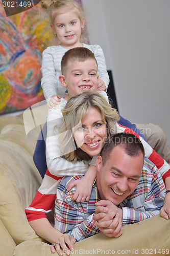 Image of happy young family at home