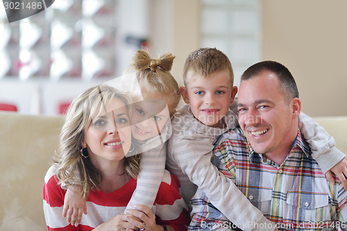 Image of happy young family at home