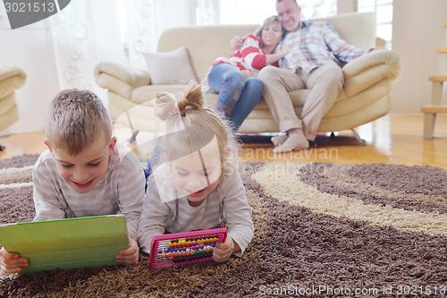 Image of happy young family at home