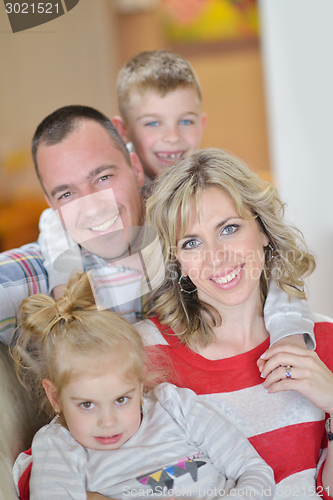 Image of happy young family at home