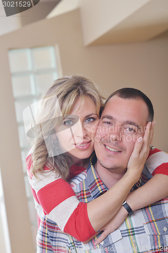 Image of happy couple at home