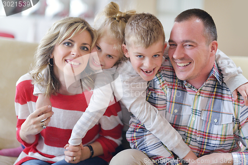 Image of happy young family at home