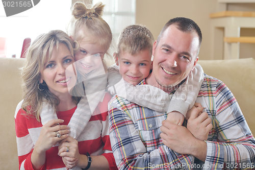 Image of happy young family at home