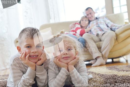 Image of happy young family at home