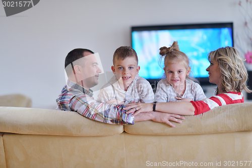 Image of happy young family at home