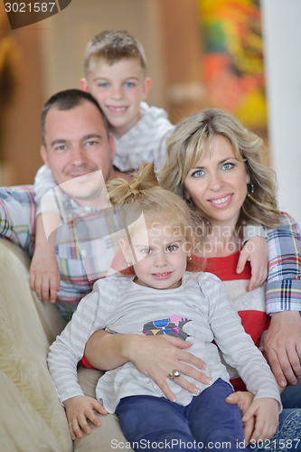 Image of happy young family at home