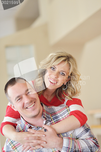 Image of happy couple at home