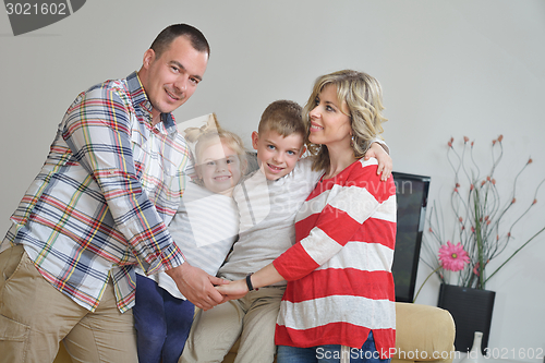 Image of happy young family at home