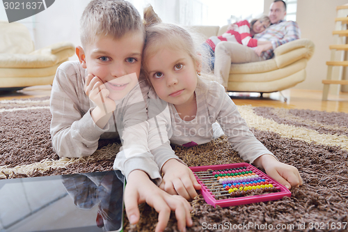 Image of happy young family at home