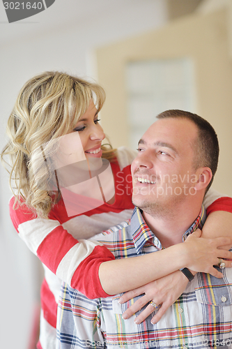 Image of happy couple at home