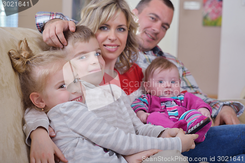 Image of happy young family at home