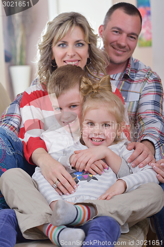 Image of happy young family at home