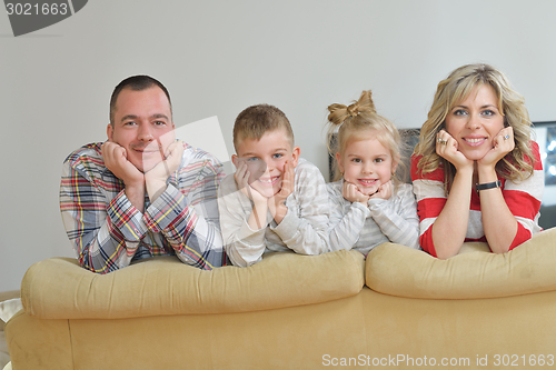 Image of happy young family at home