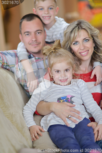 Image of happy young family at home