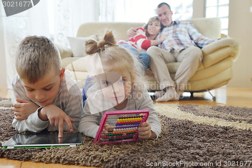 Image of happy young family at home