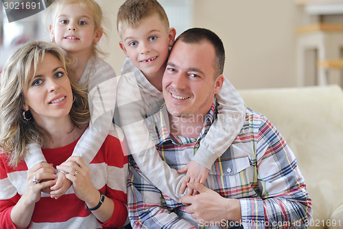 Image of happy young family at home