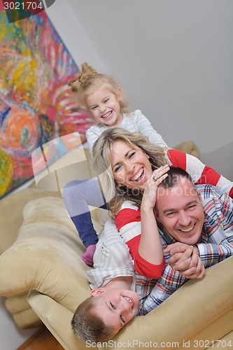 Image of happy young family at home