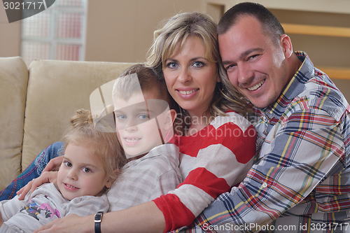 Image of happy young family at home