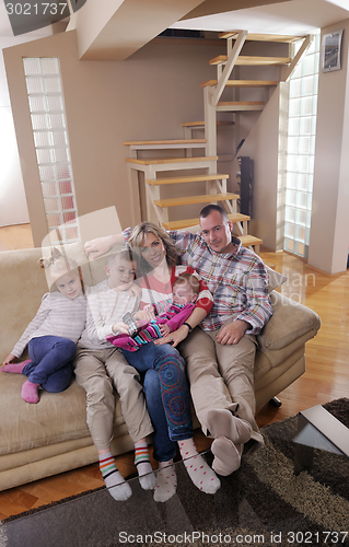 Image of happy young family at home