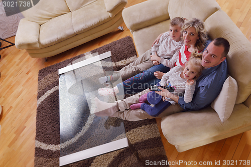 Image of happy young family at home