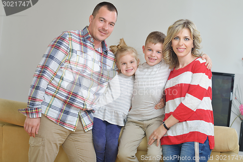 Image of happy young family at home