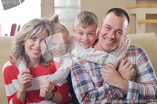 Image of happy young family at home