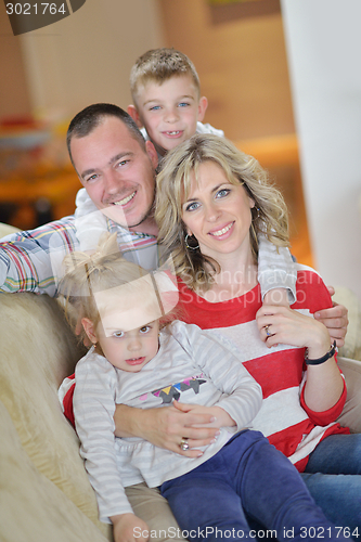 Image of happy young family at home