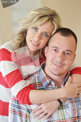 Image of happy couple at home