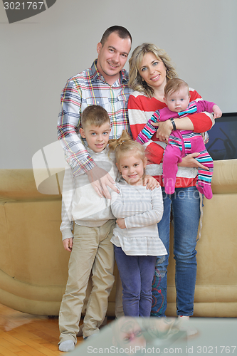 Image of happy young family at home