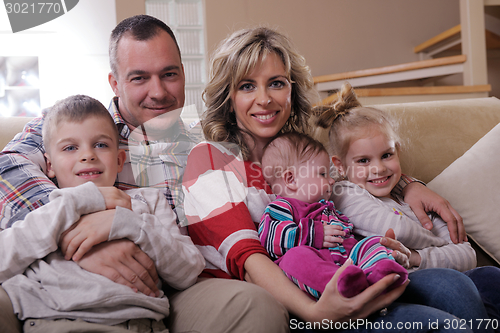 Image of happy young family at home