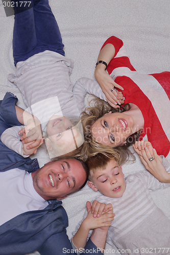 Image of happy young family at home