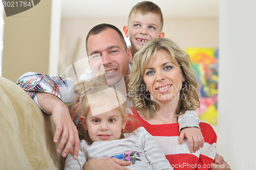 Image of happy young family at home