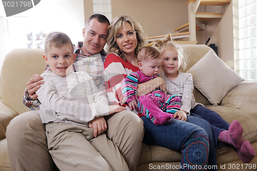 Image of happy young family at home