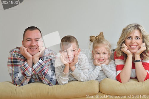 Image of happy young family at home