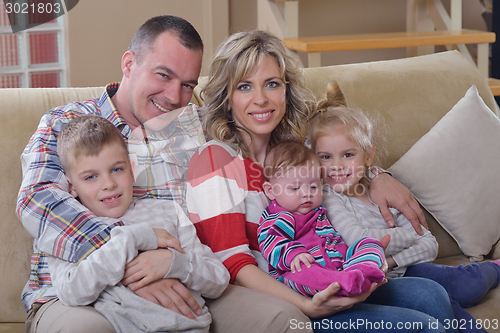 Image of happy young family at home