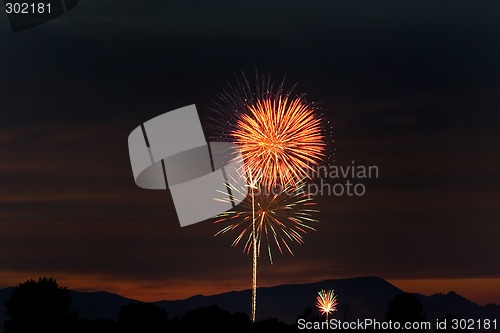 Image of Firecrackers In The Sky During Sunset