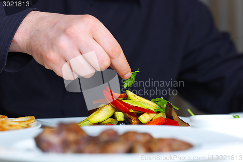 Image of chef preparing food