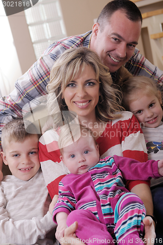 Image of happy young family at home