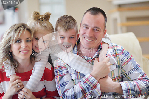 Image of happy young family at home