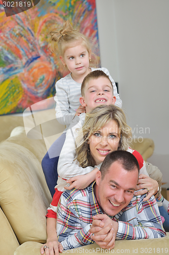 Image of happy young family at home