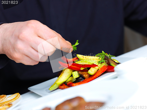 Image of chef preparing food