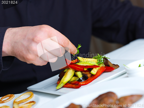 Image of chef preparing food