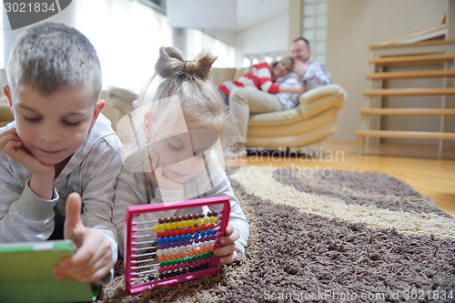 Image of happy young family at home