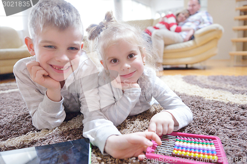 Image of happy young family at home