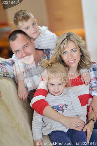 Image of happy young family at home