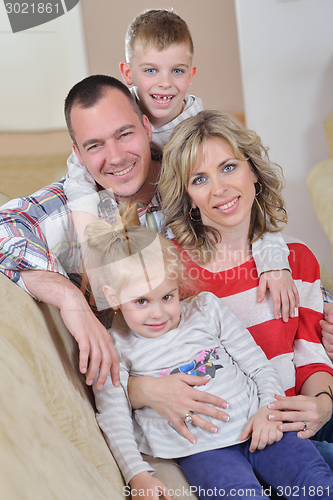 Image of happy young family at home