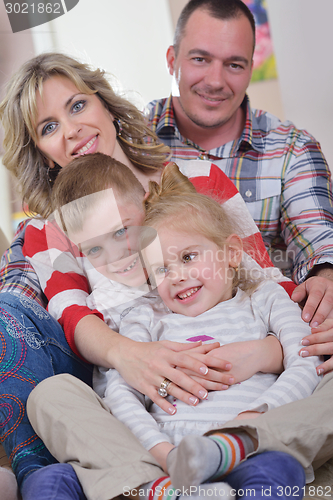Image of happy young family at home