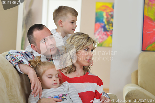 Image of happy young family at home