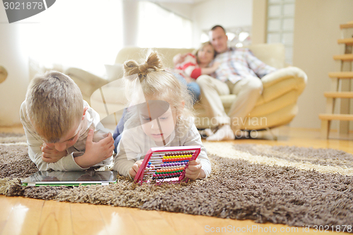 Image of happy young family at home